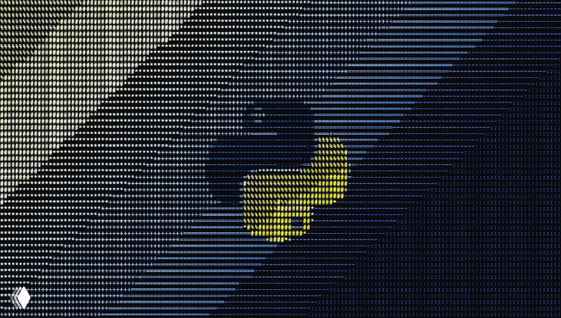 Фрагмент изображения в ASCII с ярким жёлтым акцентом на тёмном фоне, демонстрирующий передачу цветовых пятен через набор символов.