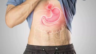 Иллюстрация живота с подсвеченным желудком и пищеводом, показывающая локализацию грыжи пищеводного отверстия диафрагмы.