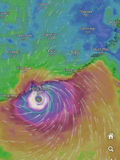 Модель ветров и давления с яркой визуализацией: глаз тайфуна у Гонконга/Шэньчжэня и направление сильных потоков ветра.