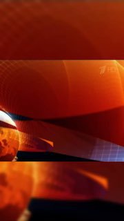 Абстрактное оранжевое фоновое изображение с геометрическими формами и бликами, похожее на экранную заставку, без людей или грузов.