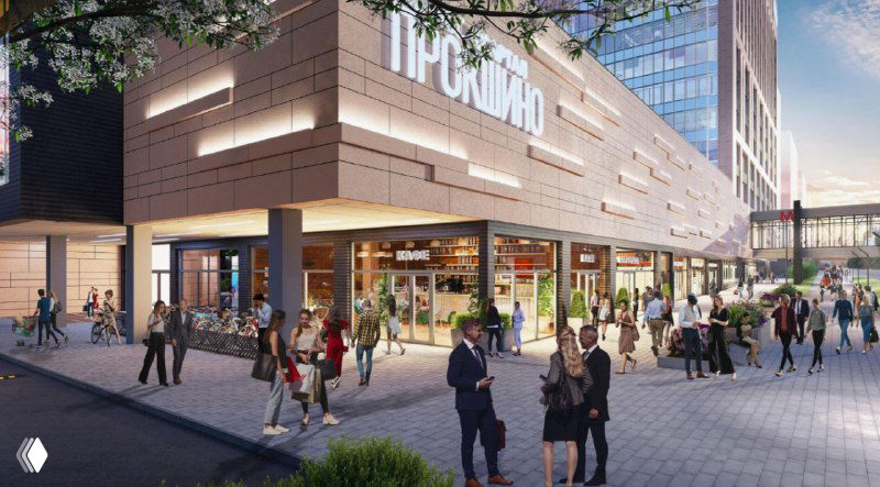 Пешеходная зона у торгового центра: витрины, зоны притяжения и люди на прогулке — демонстрация коммерческого формата «город в городе».