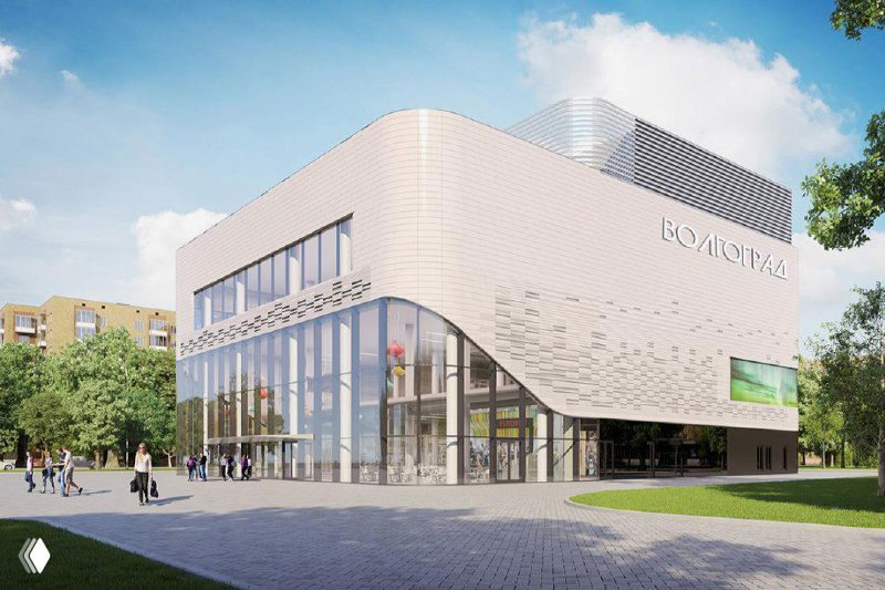 Небольшой современный торговый павильон со стеклянными фасадами и входной группой, пример малой коммерческой недвижимости в районе.