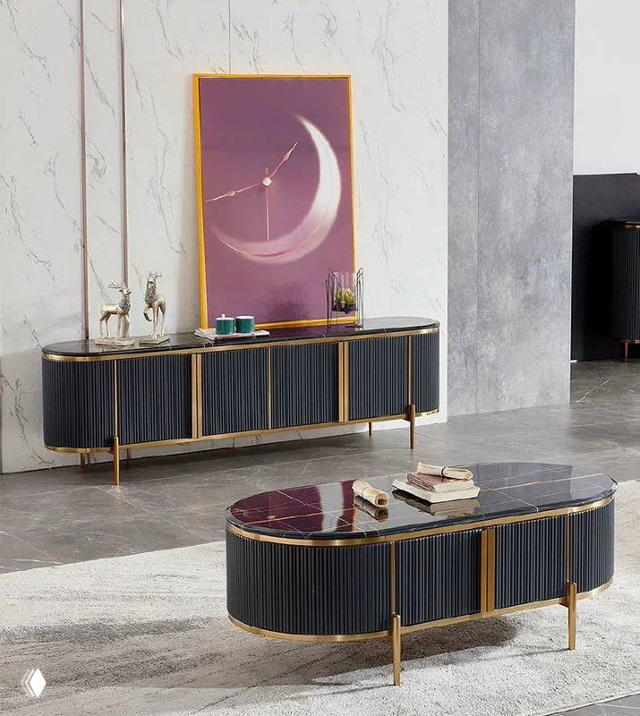 Вид на сервант и журнальный столик: тёмно-серый корпус с золотой окантовкой и декоративной картиной над тумбой, эстетика презентации товара.