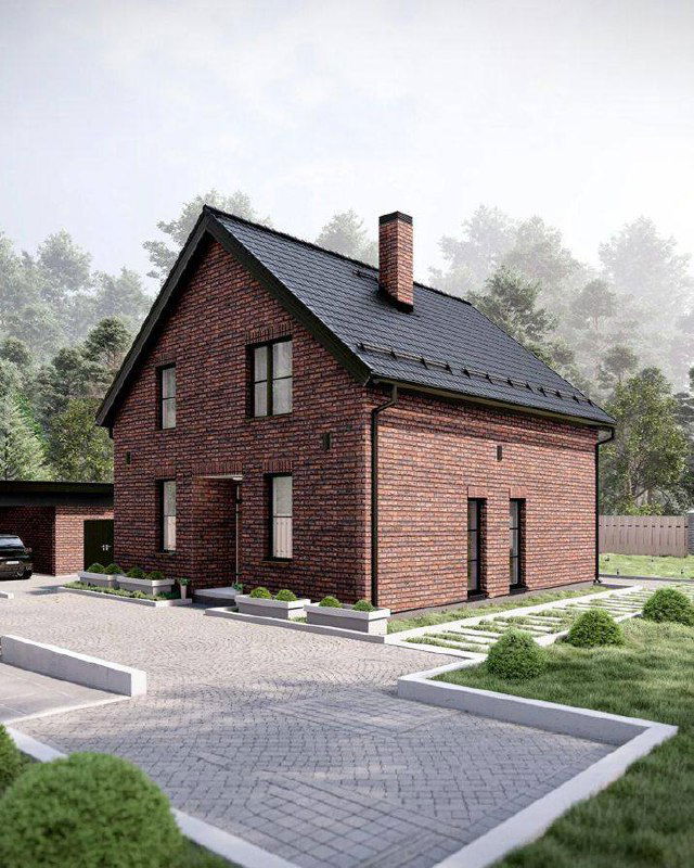 Боковой вид дома «Брюгге»: кирпичная облицовка, наклонная кровля и подъездная зона с мощением — пример проектного решения для участка.