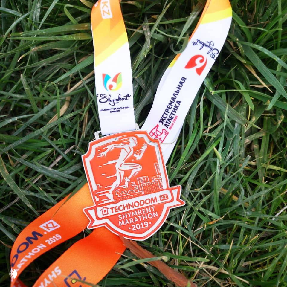 Медаль Technodom Shymkent Marathon и выдача стартпаков