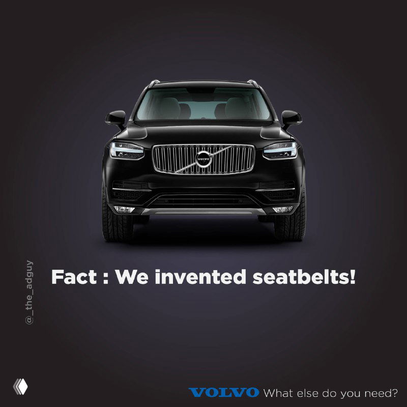 Рекламный постер Volvo: чёрный автомобиль на тёмном фоне с подписью «Fact: We invented seatbelts!» — акцент на безопасности бренда.
