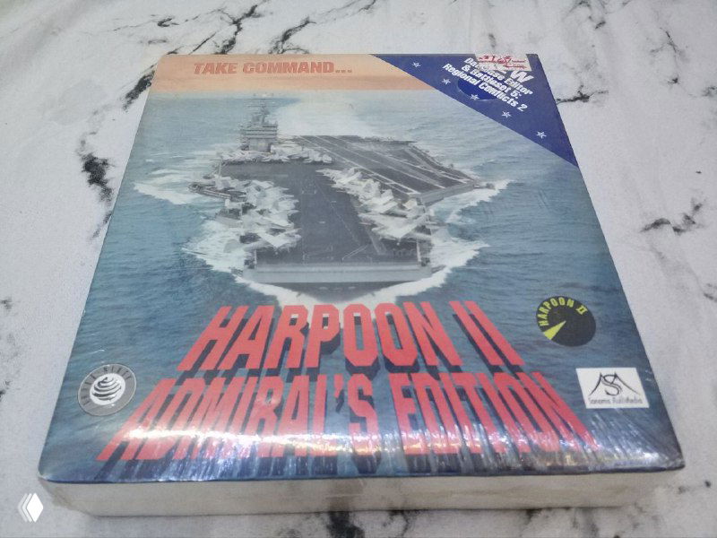 Фотография лицевой стороны Harpoon II Admiral's Edition в заводской пленке с морской иллюстрацией и крупным заголовком на обложке