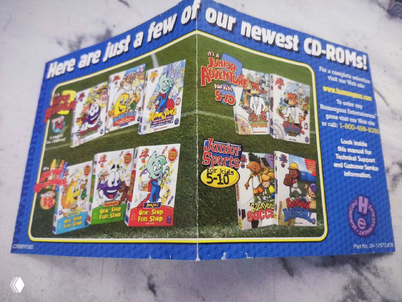 Рекламная вклейка Humongous с несколькими обложками CD-ROM: коллаж из других детских игр компании, промо в цвете на глянцевой бумаге.