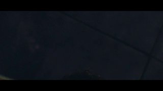 Чёрный фон кадра из ролика кампании ChatGPT: тёмная сцена с минималистичными элементами, лого бренда и кинематографическая подача