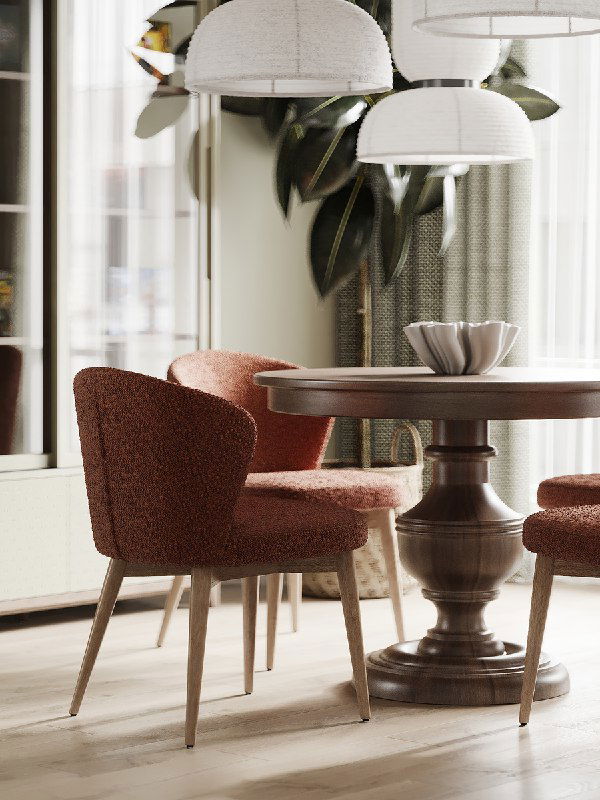 Крупный план терракотовых стульев и резного основания стола, бумажные светильники и часть шторы у окна.