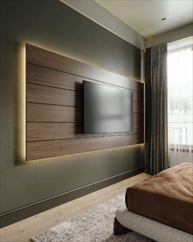 Декоративная деревянная ТВ‑панель со скрытой подсветкой на фоне приглушённой зелёной стены и плотных штор — часть интерьерной композиции.