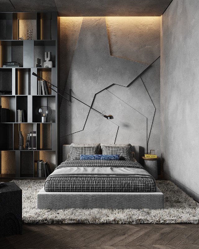 Спальная зона с рельефной бетонной панелью над кроватью, минималистичный интерьер в тёмных тонах и нишевым освещением.