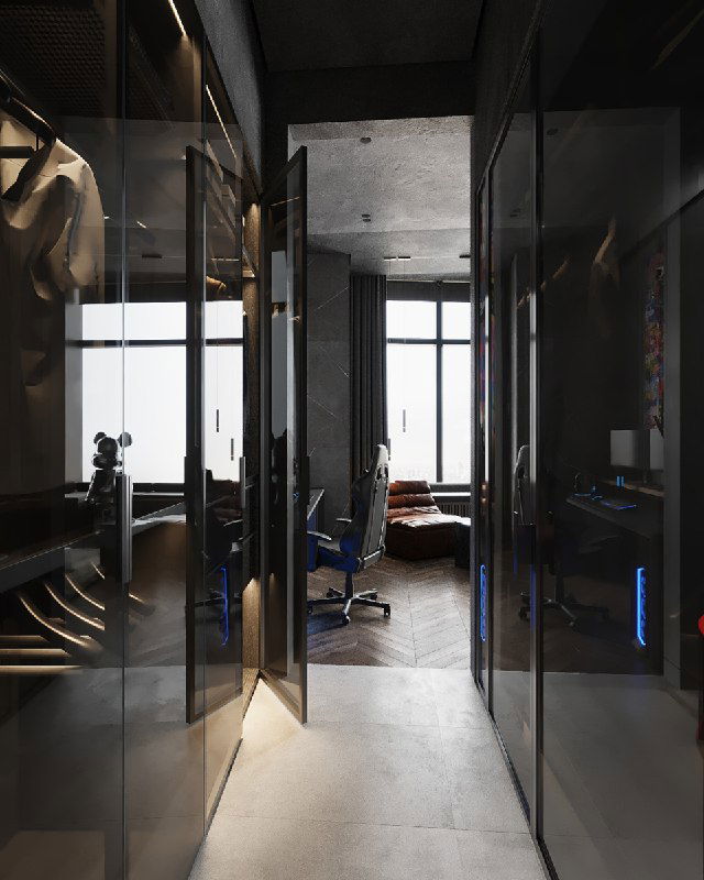 Вход в комнату через гардеробную: шкафы со стеклянными фасадами, зеркальные поверхности и вид на рабочую зону.