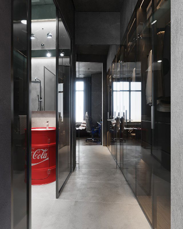 Коридор и зеркальные фасады навесного шкафа, сквозной вид на душевую и заметная красная раковина‑бочка с логотипом в интерьере проекта.