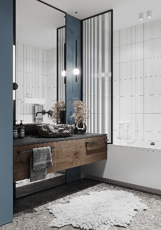 Боковой ракурс: раковина, зеркало и стеклянная перегородка душа, плитка с вертикальными линиями и контрастные материалы в интерьере ванной.