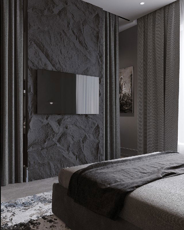 Угловой вид на спальню с текстурированной стеной и скрытым телевизором, показан переход материалов и игра света в пространстве.