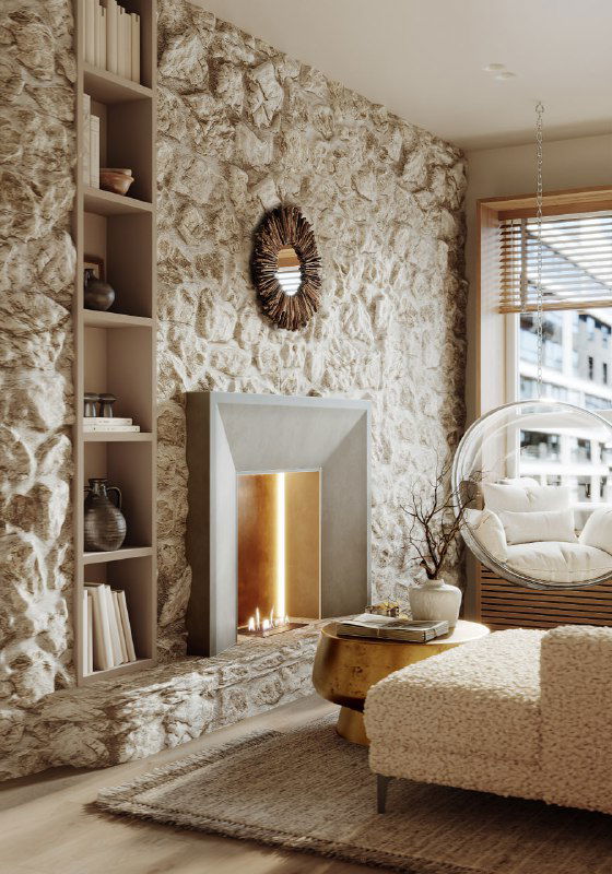 Крупный план камина и декоративного зеркала на фактурной стене, текстильный пуф, ротанговая мебель и ковер создают уютную сцену интерьерной композиции.