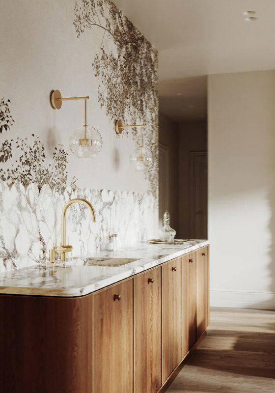 Кухонная зона с фреской ветвей на стене, тёплыми деревянными фасадами, мраморной столешницей, медными смесителями и естественным дневным освещением.