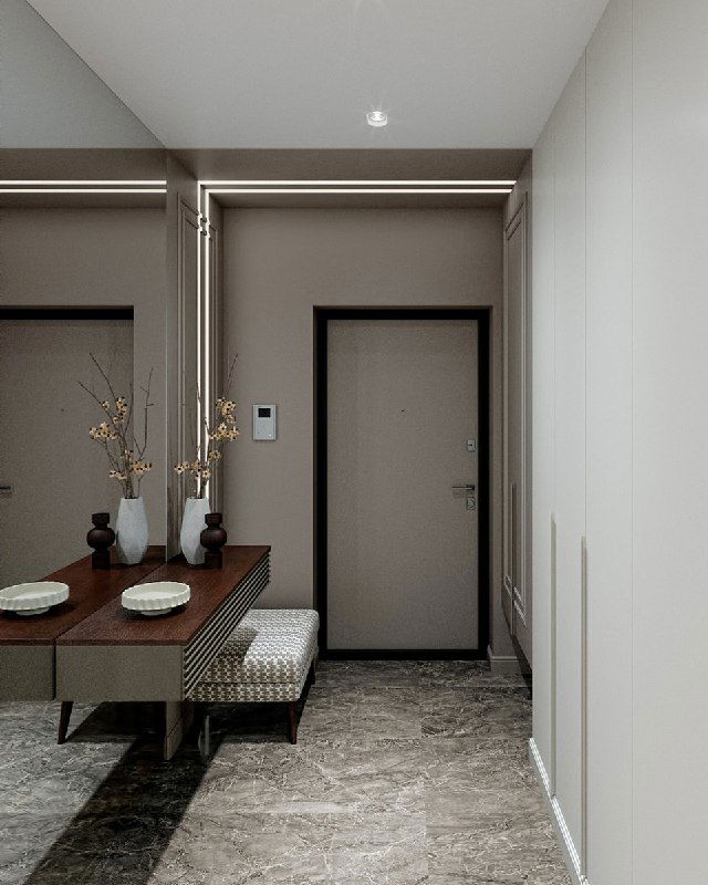 Вид прихожей со входной дверью, длинным встроенным шкафом и консолью: акцент на зеркале, пуфе и стеновой LED-полосе, визуально расширяющей пространство.