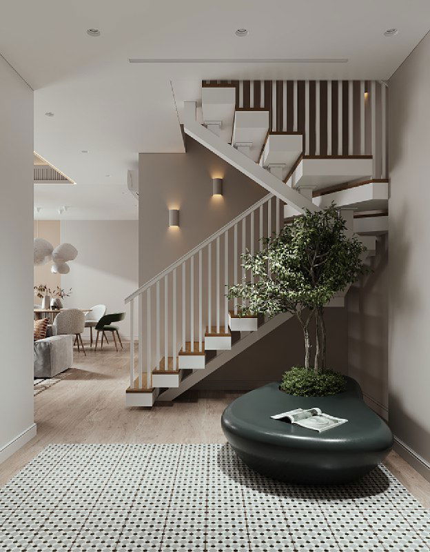 Общий вид прихожей с лестницей: пуф-кашпо с живым растением на фоне плитки-ковра с африканскими мотивами и приглушённого освещения.