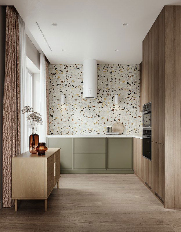 Кухонная зона без верхних шкафов: коричнево-оливковый гарнитур, зеленоватый керамогранит Тераццо на фартуке и цилиндрическая островная вытяжка.