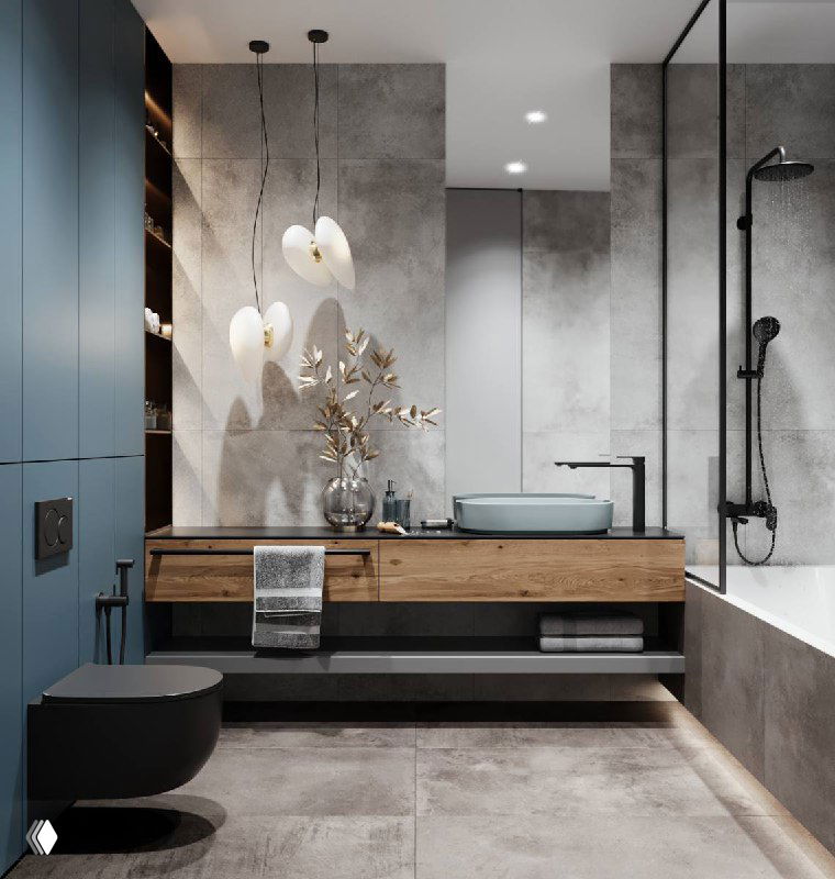 Индустриально‑скандинавская умывальная зона: бетонные стены, деревянная столешница и подвесные светильники, сочетание тёплого дерева и холодной фактуры.