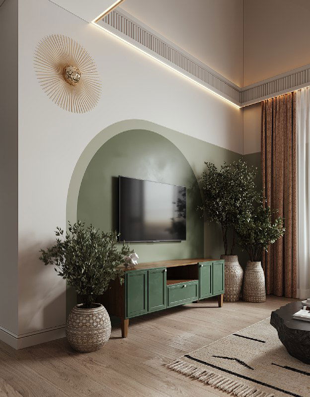 ТВ-зона с арочным зеленым акцентом и комодом, крупные вазоны и декоративный светильник создают эффект пещерной эстетики в гостиной.