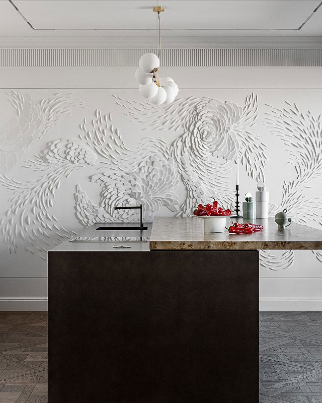 Фотография рабочего острова с интегрированной мойкой и зоной готовки: техника скрыта в выдвижной столешнице, на фоне виден объёмный рельеф от КимАрт.