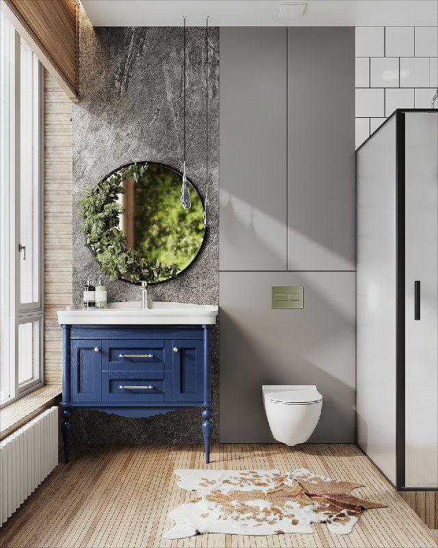 Зона умывания с яркой синей тумбой и большим круглым зеркалом — зелень фитостены видна в отражении; рядом унитаз и душевая кабина.