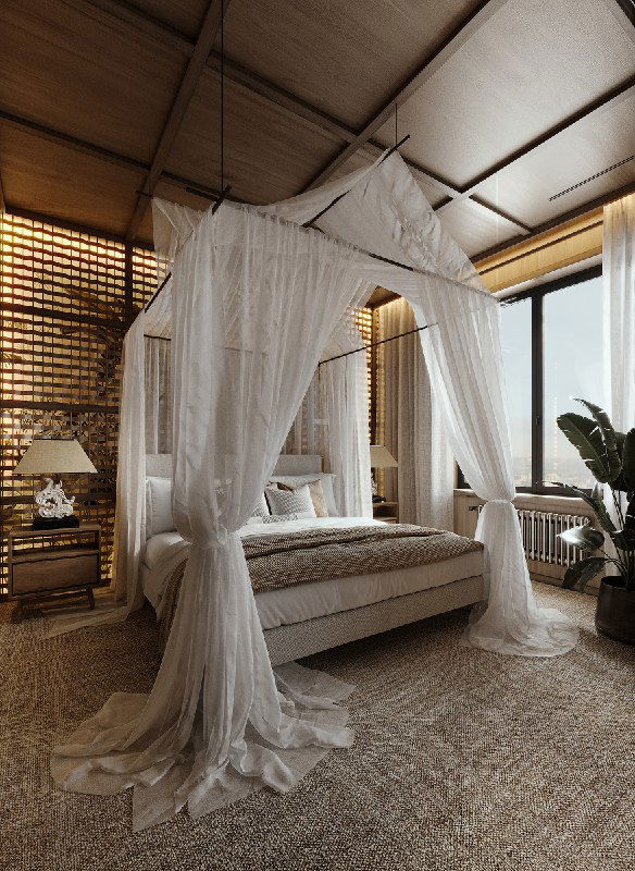 Уютный вид сбоку на спальню: плетеные элементы, тёплые деревянные тона, ковровое покрытие и воздушная драпировка вокруг кровати.