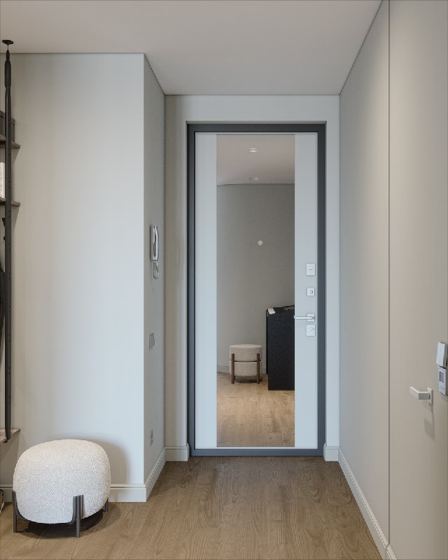 Вид от входной двери на прихожую с зеркалом во весь рост; аккуратный коридор, пуф у стены и открытое пространство, ведущее к кухне и гостиной.