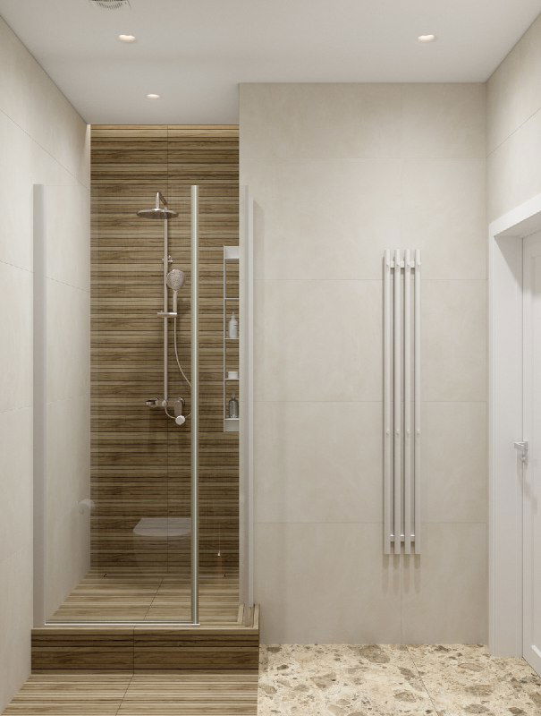 Минималистичная душевая кабина со стеклянной перегородкой, нишей в деревянной облицовке и компактным полотенцесушителем на нейтральной плитке.