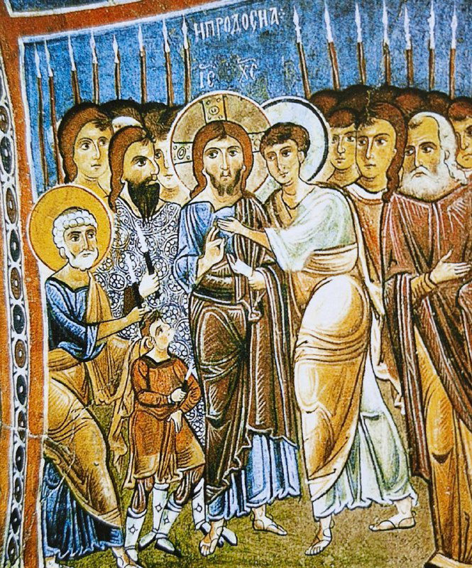 Сцена из жизни святого на стене каппадокийской церкви: несколько фигур, богатая драматическая пластика, насыщенные цвета и золотые нимбы.