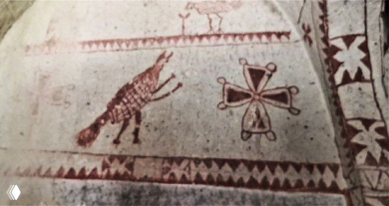 Изображение красной охры: саранча между крестами и геометрические орнаменты — пример иконоборческого символизма и упрощённой знаковой живописи Каппадокии.