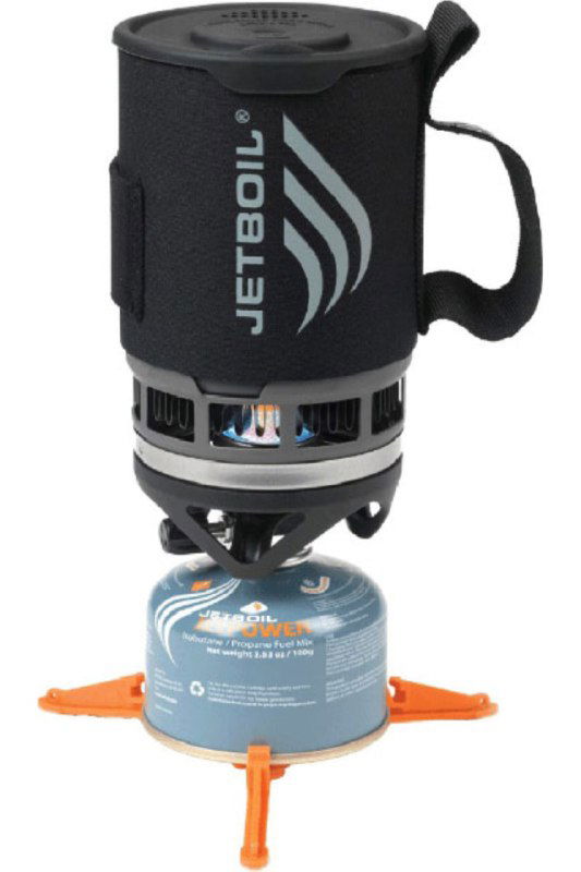 Компактная газовая система приготовления Jetboil на баллоне: горелка с чашей и теплообменником, установлена на маленькой подставке.