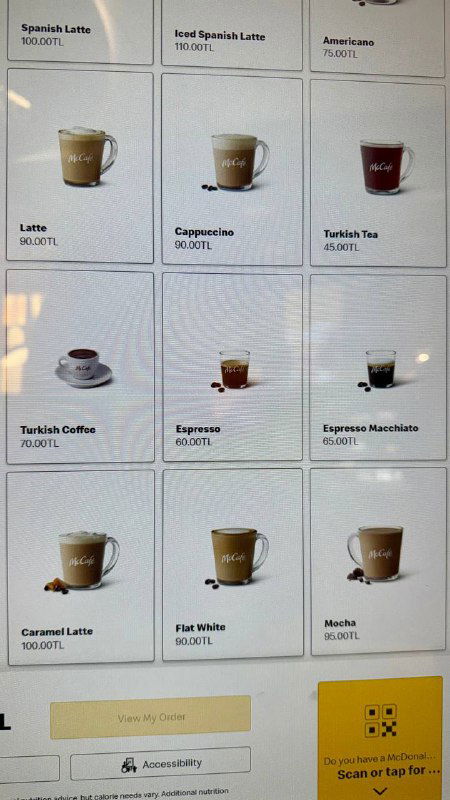 Крупные иконки напитков на меню: латте, капучино, турецкий кофе и чай — ряд вариантов горячих напитков в McCafé