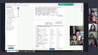 Фрагмент онлайн‑занятия: на экране тестовые задания и небольшие окна с преподавателями и учениками, виден рабочий материал.