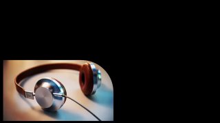 Крупный план серых наушников на тёмном фоне — иллюстрация прослушивания аудиокниг на YouTube и практики английского языка.