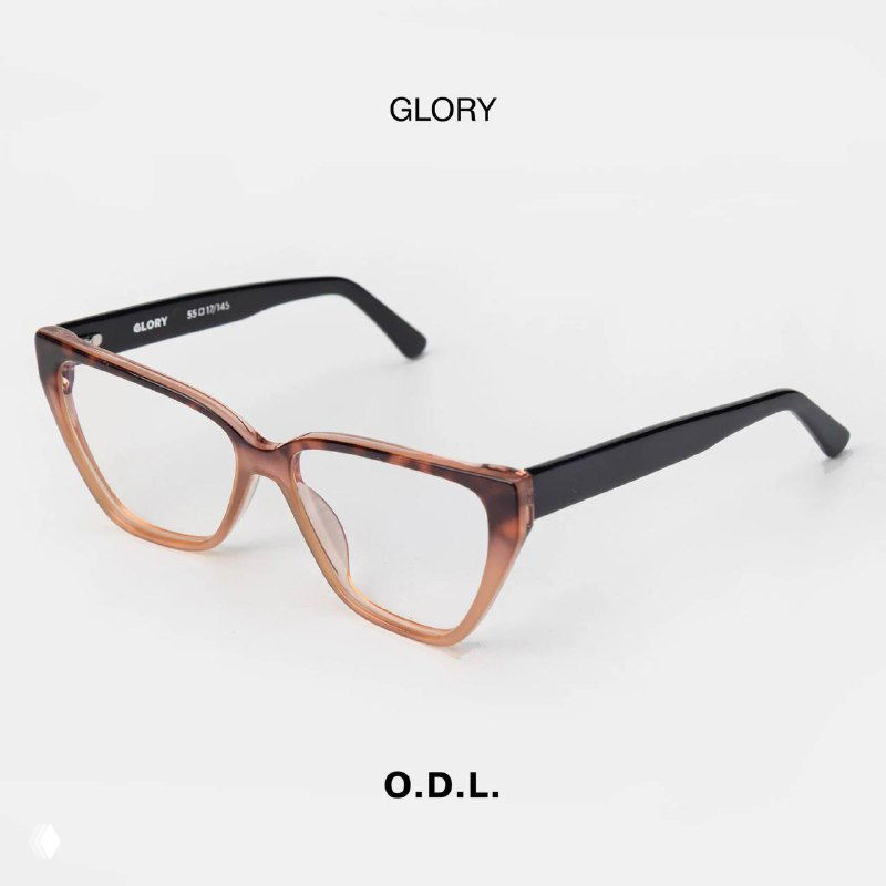 Оправa GLORY от O.D.L. на белом фоне: мягкая геометрия, градиентный тон прозрачного ацетата и контрастные чёрные дужки.