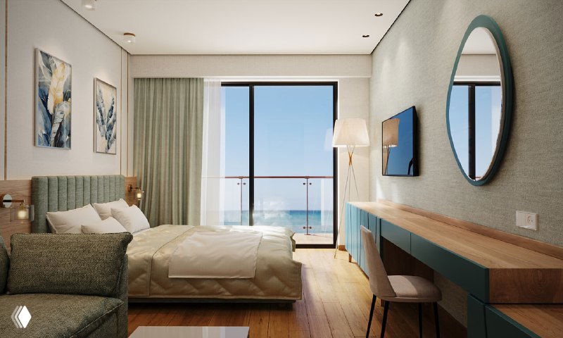 Интерьер студии 36,76 м²: зона с кроватью, рабочим столом и балконом с видом на море, светлая отделка и окна до пола.