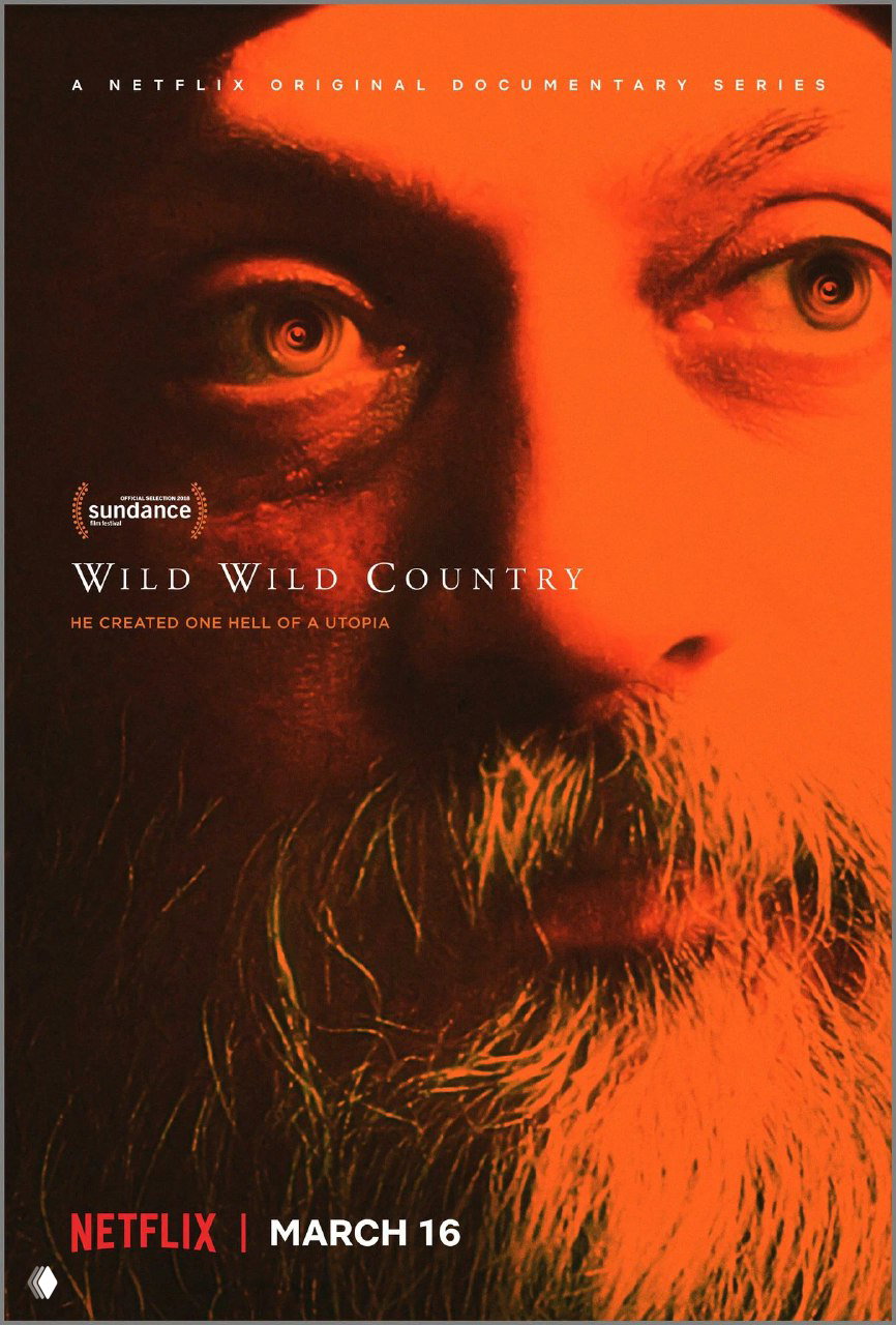 Постер сериала «Wild Wild Country»: крупный план лица в тёплых оранжевых тонах, выразительные глаза и борода.