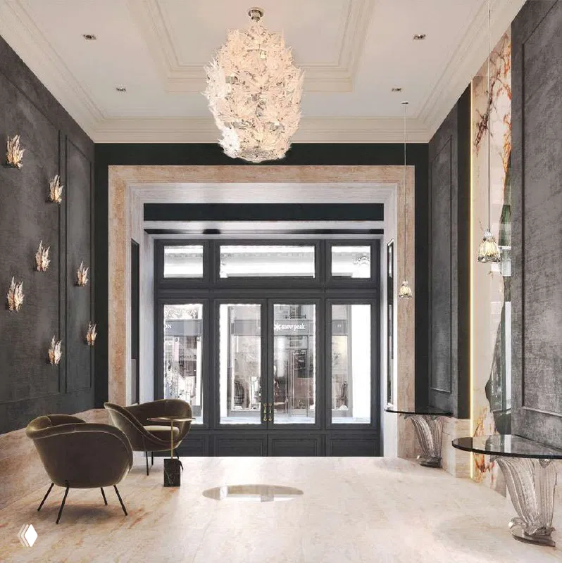 Элегантная входная зона с креслами и большими дверными проёмами — парадное пространство современного клубного дома на Кузнецком мосту.