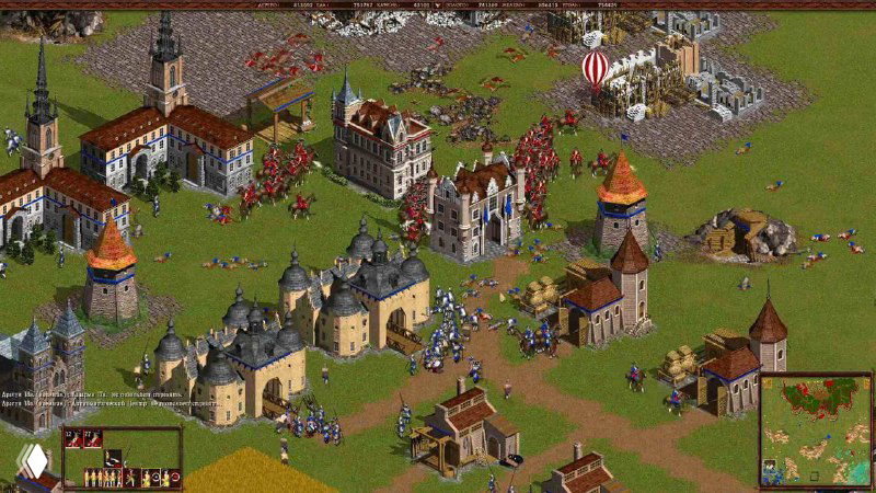 Изометрический вид на средневековые здания и войска на карте стратегии, множество мелких объектов и пасторальный пейзаж — напоминание про «Казаки».