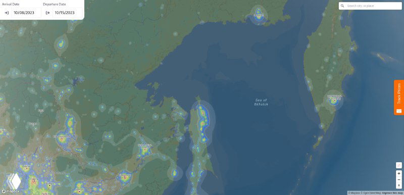 Региональная карта Дальнего Востока с тепловой индикацией уровней светового загрязнения, видны прибрежные и городские источники света.