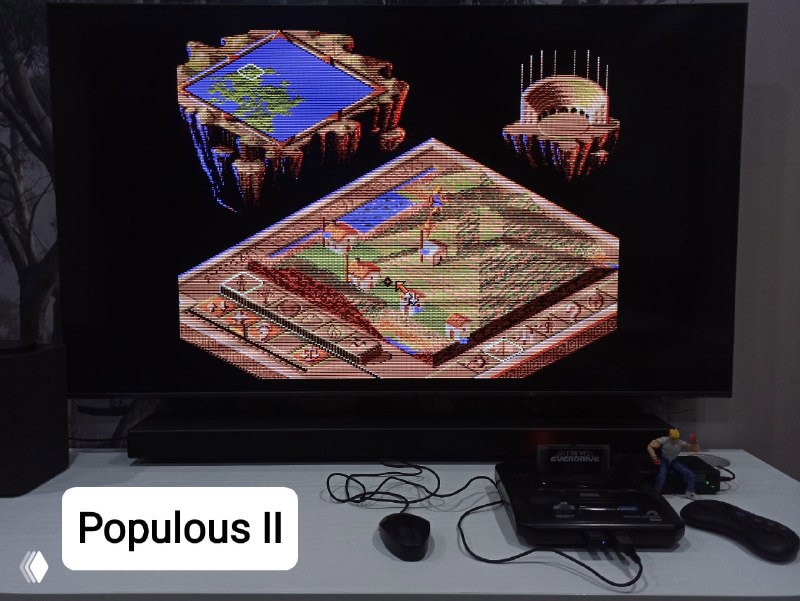 Изображение игры Populous II, запущенной на Mega Drive, видно управление и расположение мышей перед экраном, подтверждающее поддержку мыши в играх.