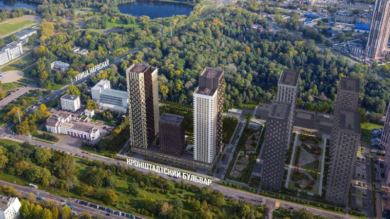 Аэрофотосъёмка концепта ЖК Нарвин: три башни на фоне зелёных насаждений и дорожной инфраструктуры, общая композиция застройки.