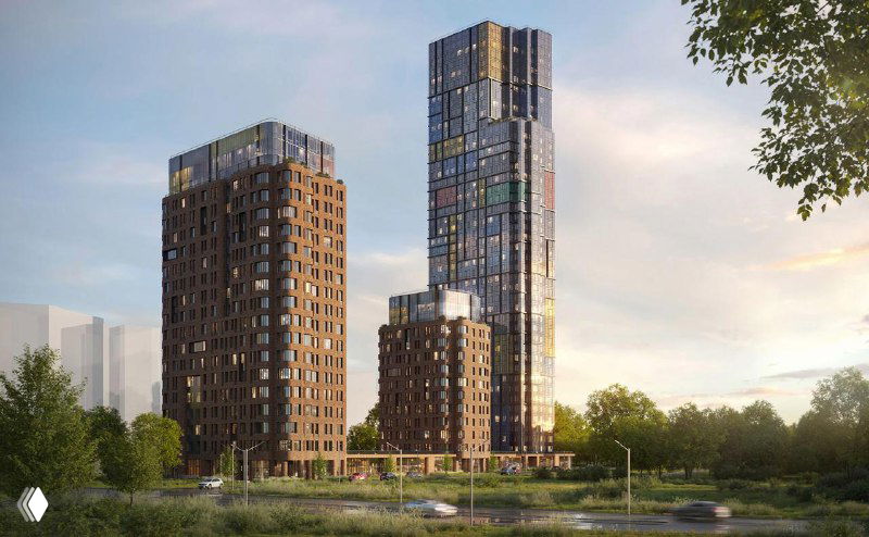 Общий вид жилого квартала с корпусами разной высотности и зелеными зонами на переднем плане, показывающий масштаб проекта.