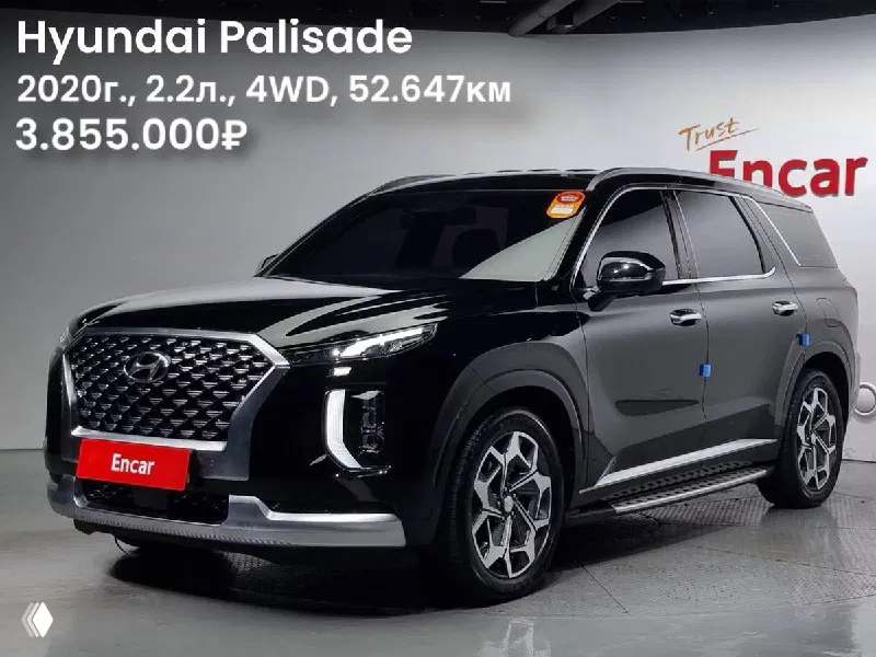 Ещё один внешний кадр Hyundai Palisade 2020 года с угла: чёрный кузов, акцент на форму фар и переднюю часть автомобиля, указана цена в объявлении.