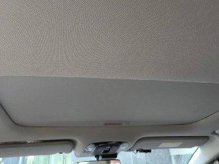 Потолок и крыша салона Hyundai Custo: обзор потолочной обивки, освещение и козырёк, нейтральный серый материал без повреждений.