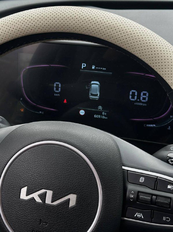 Комбинация приборов KIA Sportage 2022 — цифровая панель с индикацией передач и ключевых параметров, вид с места водителя.